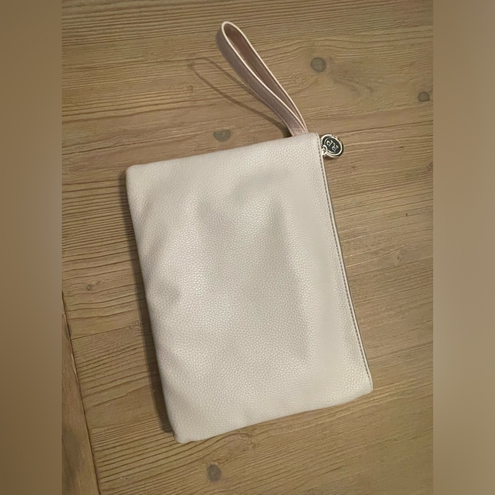 Rachel Parcell Itzy Ritzy Diaper clutch and changing pad.